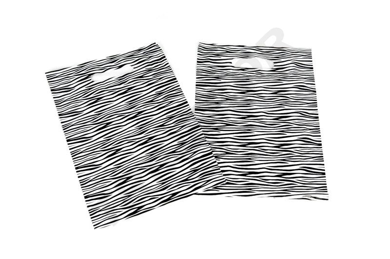 Bolsa de plástico estampado cebra con asa troquelada de 25x35cm 100 unidades